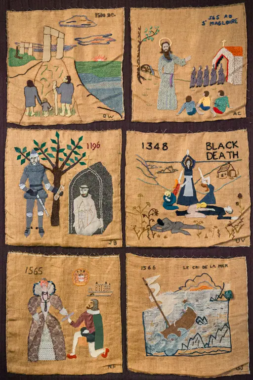 A collection of six embroidered panels depicting historical events from 1500 BC to 1566, including scenes of the Black Death and local figures.